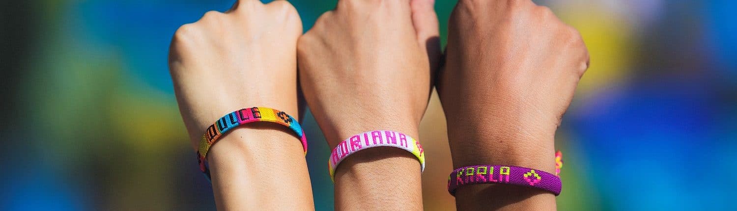 Acerca de Nosotros 3 arms showing wrist bands- Acerca-de-Nosotros Riviera Nayarit Visitors and Conventions Bureau