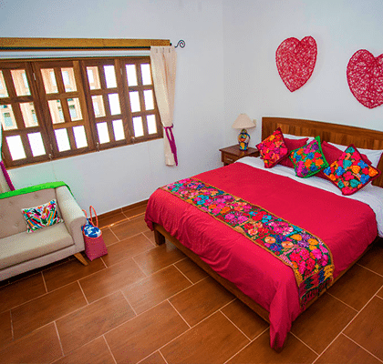 Typical bedroom in Hotel Refugio del Mar suites