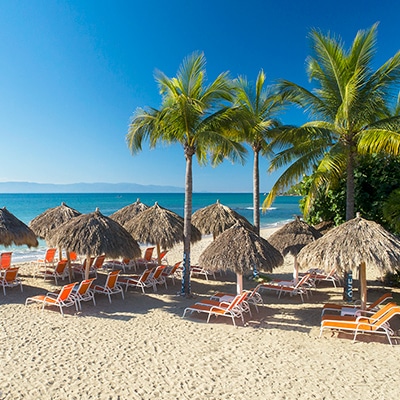 club-de-playa-matlali Sandy beach with lounge chairs and shade at Grand Matlali Hills Resort & Spa